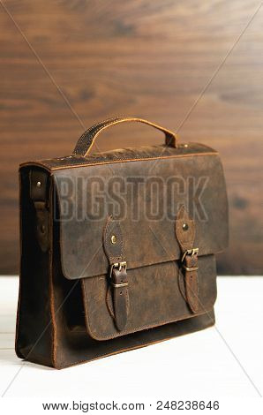 Bag Briefcase For Businessman Men, Leather Brown Bag On A Wooden Background. Men's Fashion, Accessor