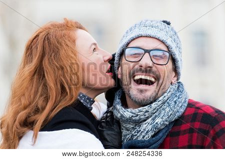 Smiled Guy Listen To Woman. Happy Men From Woman Story. Woman Whispers To Men In Glasses. Close Up O