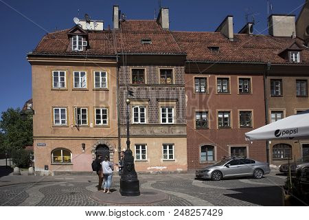 The Old Town With Ancient Buildings. The Street Name Is Szeroki Dunaj