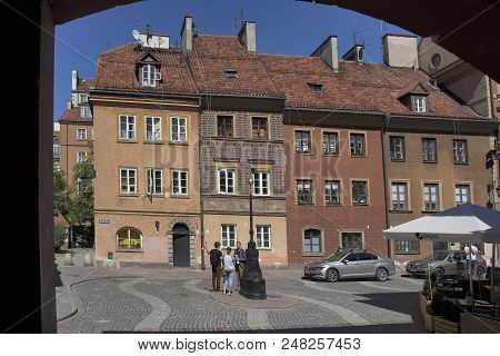 The Old Town With Ancient Buildings. The Street Name Is Szeroki Dunaj