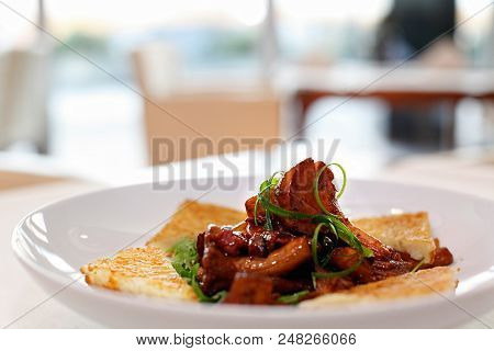 Fried Chanterelle Mushrooms With Fried Bread And Young Onion -delicatesse