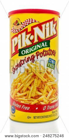 Winneconne, Wi - 1 July 2018: A Container Of Pik Nik Shoestring Potatoes On An Isolated Background.