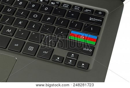 Flag Of Azerbaijan On Laptop Keyboard, Close-up.