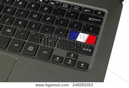 Flag Of France On Laptop Keyboard, Close-up.