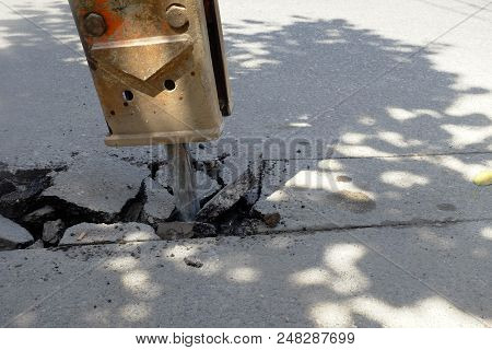 The Road Drilling Machine Are Digging Road Surface.