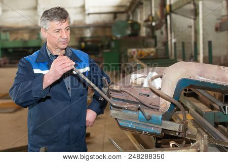 Belarus, Gomel, 25 April 2018. Metallurgical Plant. Working Behind A Metal-cutting Machine