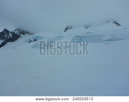 Crevasses And Seracs On A Glacier