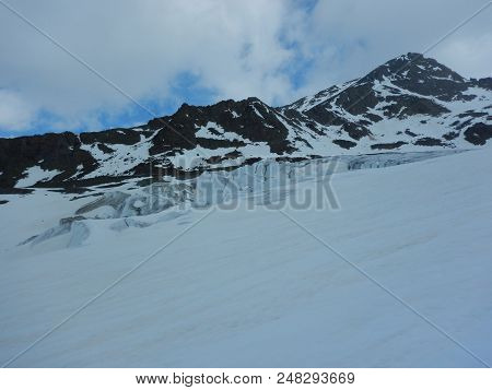 Crevasses And Seracs On A Glacier