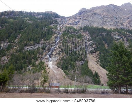 Waterfall On An Alpine Stream