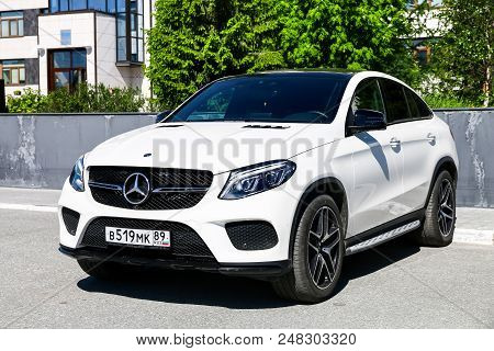 Novyy Urengoy, Russia - June 27, 2018: White Motor Car Mercedes-benz C292 Gle350 In The City Street.