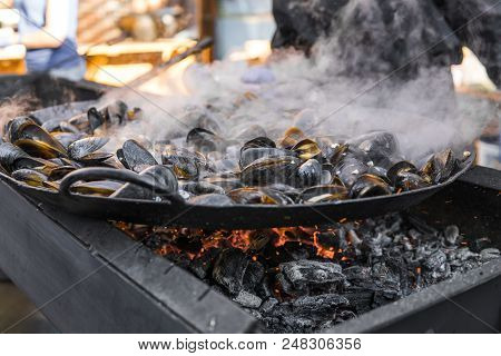 Fresh Mussels At Grill Pan. Seafood Barbecue Outdoors. Picnic Healthy Food, Mussels In Shells. Plent