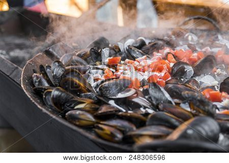 Fresh Mussels At Grill Pan. Seafood Barbecue Outdoors. Picnic Healthy Food, Mussels In Shells. Plent