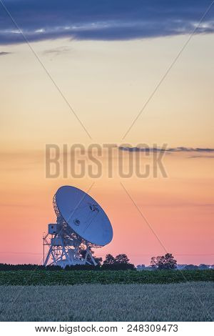 Colorful Pastel Summer Sky Over Radiotelescope Dish