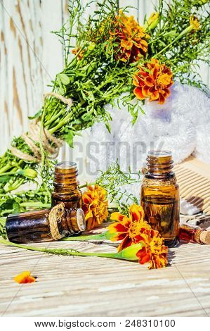 Nettle Tincture In A Small Bottle And Fresh Leaves On White Wood, Medicinal Herb For Overweight, Dia