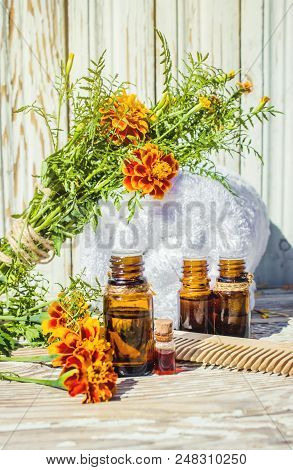 Nettle Tincture In A Small Bottle And Fresh Leaves On White Wood, Medicinal Herb For Overweight, Dia
