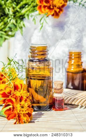 Nettle Tincture In A Small Bottle And Fresh Leaves On White Wood, Medicinal Herb For Overweight, Dia
