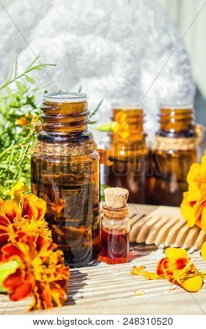 Nettle Tincture In A Small Bottle And Fresh Leaves On White Wood, Medicinal Herb For Overweight, Dia