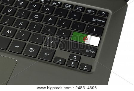 Flag Of Algeria On Laptop Keyboard, Close-up.