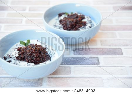 Bubur Ketan Hitam, Indonesian Sweet Dessert Made From Black Glutinous Rice Porridge With Coconut Mil