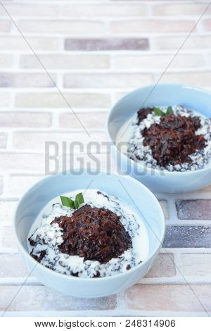 Bubur Ketan Hitam, Indonesian Sweet Dessert Made From Black Glutinous Rice Porridge With Coconut Mil