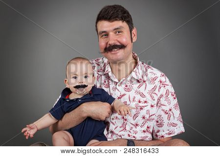 Handlebar Mustache Family-father And Son Lookalike, Isolated On Grey With Vignette