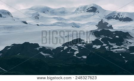 Glacier In Iceland On A Mountain Covered In Clouds Tele Lens