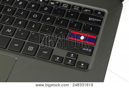 Flag Of Laos On Laptop Keyboard, Close-up.