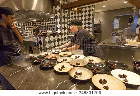 Stockholm, Sweden - Jun 16, 2018: Chef Preparing Food At Open Kitchene Of Restaurant, In The Cultura