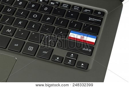 Flag Of Mari El On Laptop Keyboard, Close-up.