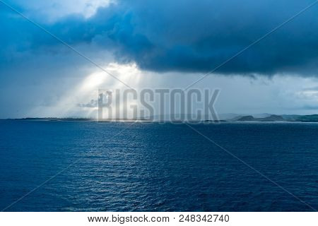 Sun Shining Through The Clouds On The Sea Norway