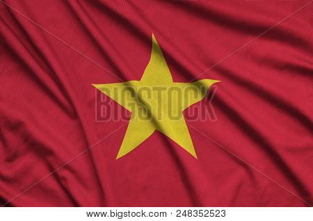 Vietnam Flag  Is Depicted On A Sports Cloth Fabric With Many Folds. Sport Team Waving Banner
