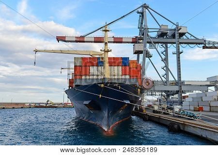 Container Ship Moored At Port  Loading In Progress