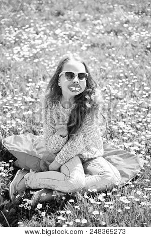 Fashionista Concept. Child Posing With Sunglasses Cardboard Smiling Lips For Photo Session At Meadow
