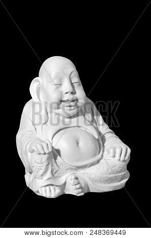 Netsuke - Japanese Man In A Robe Isolated On Black Background