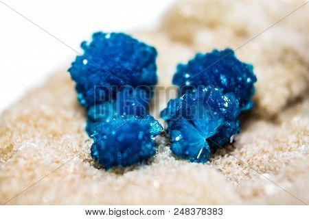 Natural Blue Stones Cavansite On A White Substrate