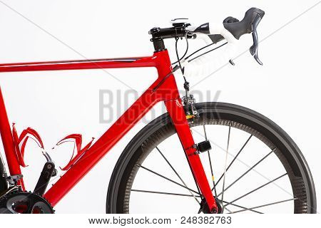 Cycling Sport Concepts. Closeup Of Professional Road Bike With Deep Carbon Rims Wheelset. Horizontal