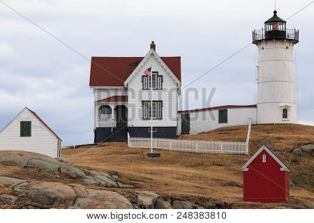 Cape Neddick Lighthouse On Cloudy Day On Maine Coast