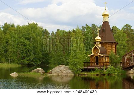 Church Of The Apostle Andrew The First-called On The Vuoksa River On A June Cloudy Day. Leningrad Re