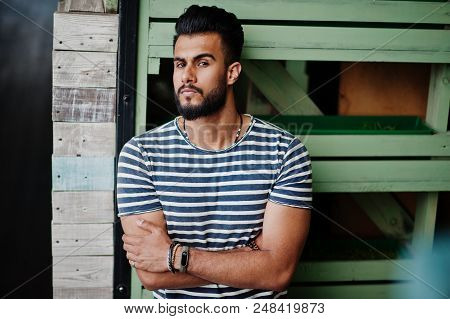 Handsome Tall Arabian Beard Man Model At Stripped Shirt Posed Outdoor. Fashionable Arab Guy.