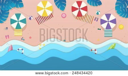 Top View Sea, The Beach With Umbrellas, Sun Beds And Tropical Leaves Around. Sea With Waves And Recr
