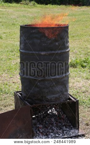 Bin With Flames That Come Out To Light The Fire