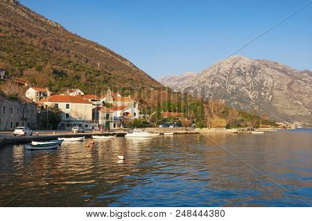 Sunny Mediterranean Landscape In Winter. Montenegro, Bay Of Kotor, View Of Small Town Of Kamenari