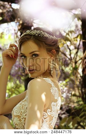 Beautiful Young Woman Bride  In Luxurious Wedding Dress And Diadema