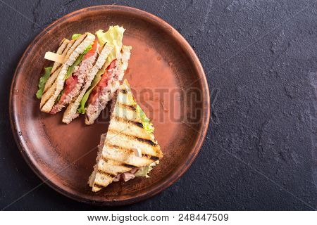Club Sandwith With Tuna , Tomatoes And Lattuce