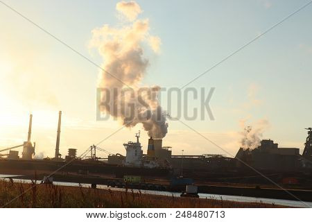 Ijmuiden, The Netherlands - July 5th 2018: Tata Steel Company In Ijmuiden By Sunset
