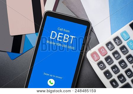 Top View Of Incoming Call On Smart Phone Screen From Creditor. Concept Of Business Financial And Deb