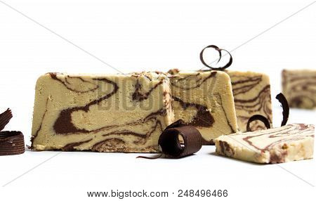 Halva With Cacao Pieces On White Background