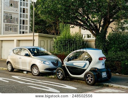 Strasbourg, France - Jun 6, 2017: Renault Twizi Electric Car Parked In Front Of Lancia Ypsilon Car