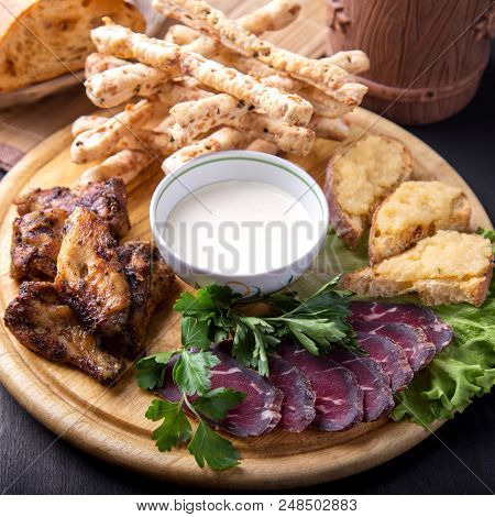 Beer Snack: Fried Chicken Wings, Basturma,  Sandwiches With Capelin Caviar And   Bread Sticks With S