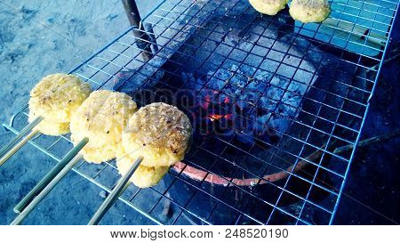 Thai Street Food Sticky Rice Grill On Charcoal Stove.
